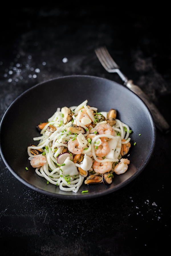 Kohlrabi Spaghetti With Seafood And Chives Photograph by Jan Wischnewski