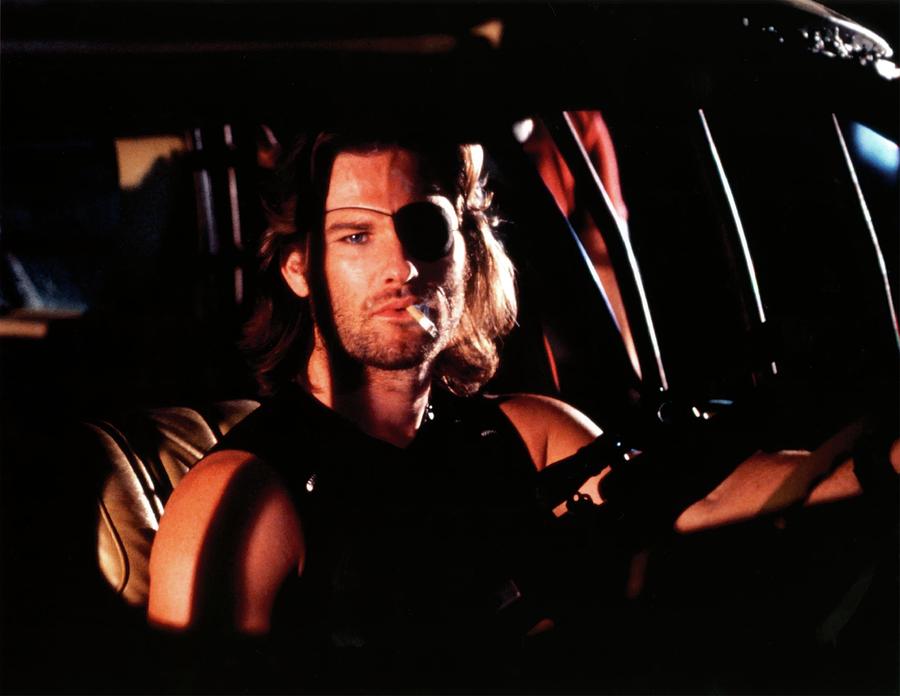 KURT RUSSELL in ESCAPE FROM NEW YORK -1981-. Photograph by Album
