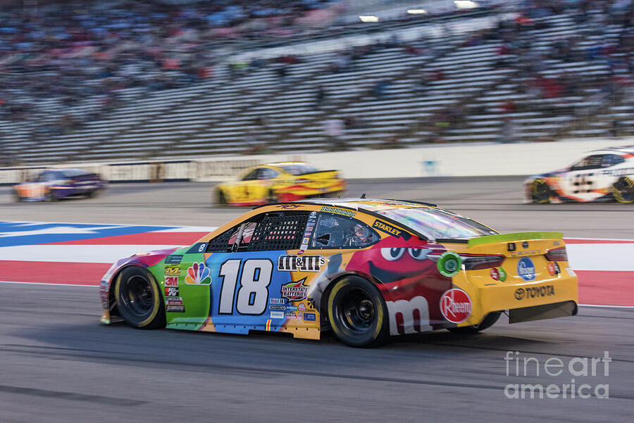 Sports Photograph - Kyle Busch coming into the pits by Paul Quinn