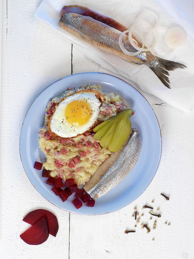 Labskaus traditional Dish From Northern Germany Featuring Herring, Egg And Gherkins Photograph by Wolfgang Pfannenschmidt