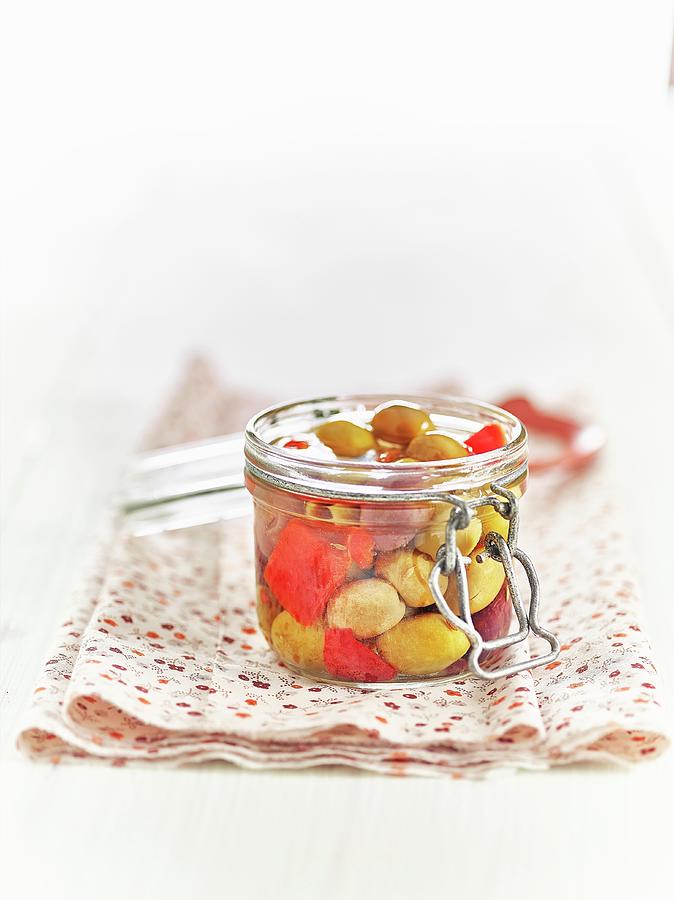 Lacto Fermented Green Olives And Red Peppers In A Mason Jar Photograph by Frdric Perrin