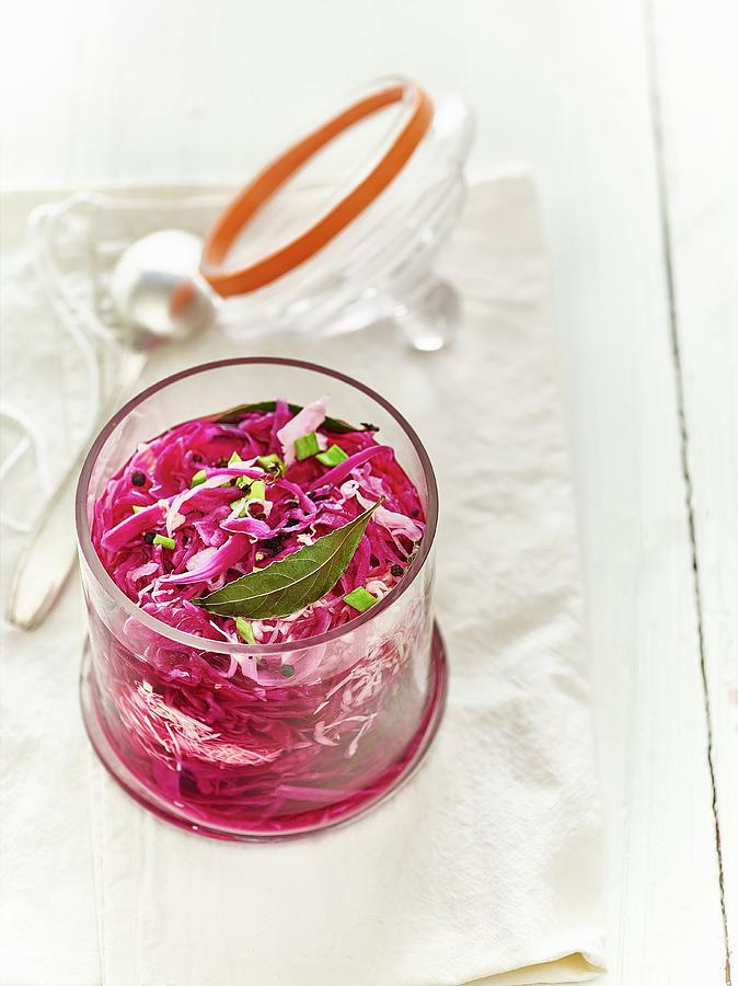 Lacto Fermented Red Cabbage With Bay Leaves And Sprouts Photograph by Frdric Perrin