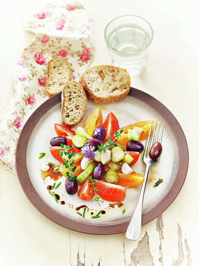 Lacto Fermented Tomatoes, Cucumbers, And Olives Served With Herbs And Garlic Bread Photograph by Frdric Perrin
