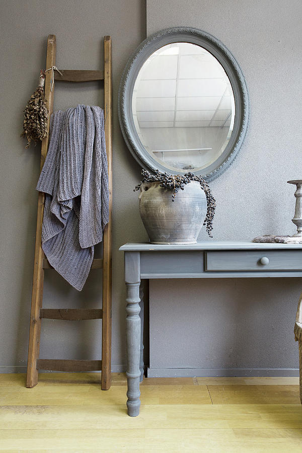 Ladder Next To Console Table In Elegant, Rustic Interior Photograph by Jansje Klazinga