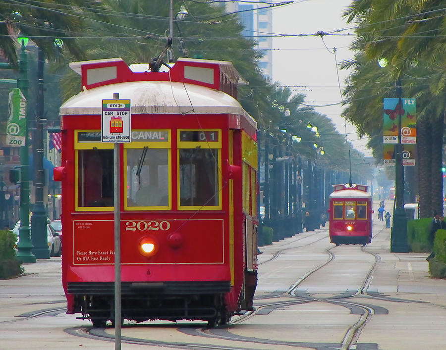 New Orleans Photograph - Ladies in Red Canal Street Streetcar race by Toni and Rene Maggio