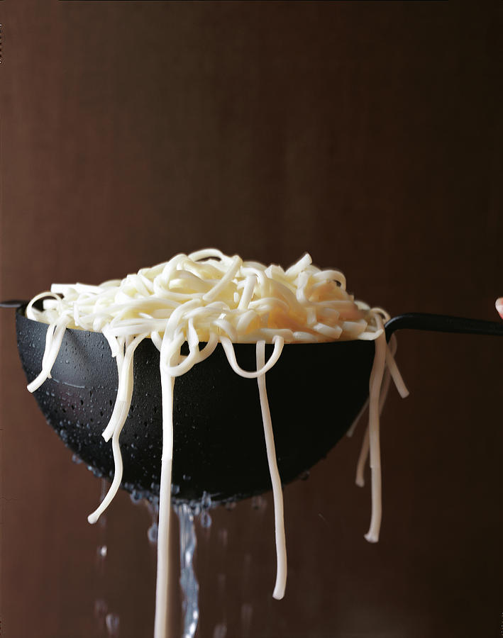 Ladle Of Spaghetti Photograph by Romulo Yanes