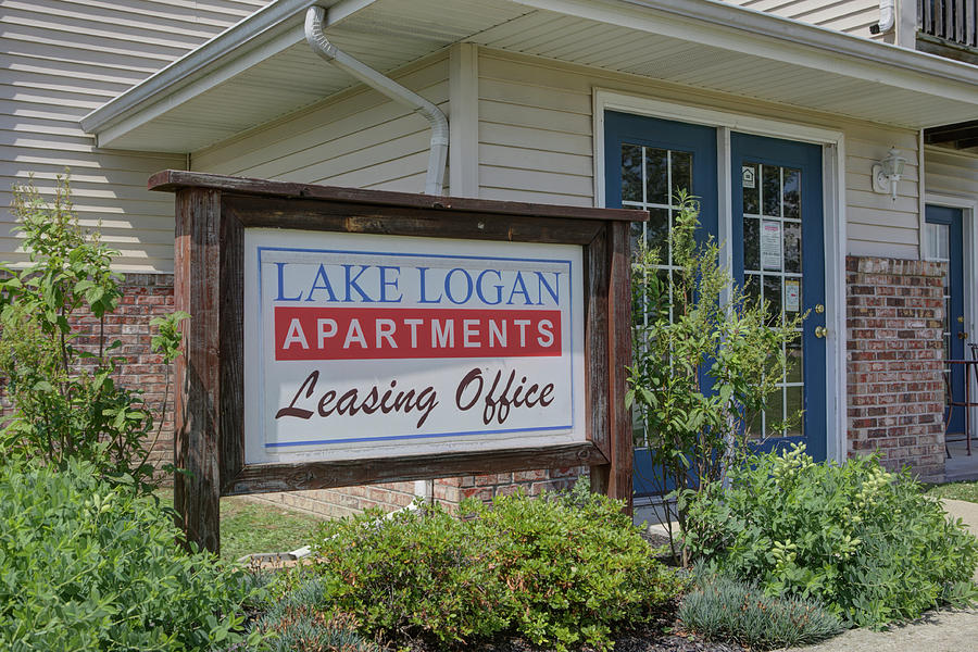 Lake Logan apartments sign Photograph by Jeff Kurtz