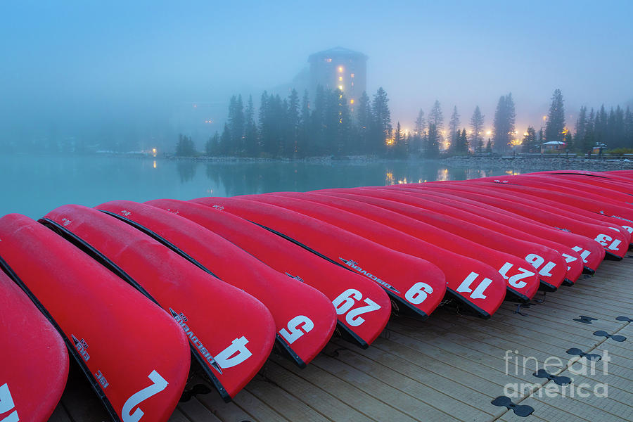 Lake Louise Red Canoes Photograph by Inge Johnsson