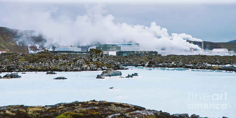 Lake with high amount of dissolved mineral salts and thermal power plant in the background, blue lagoon. Photograph by Joaquin Corbalan