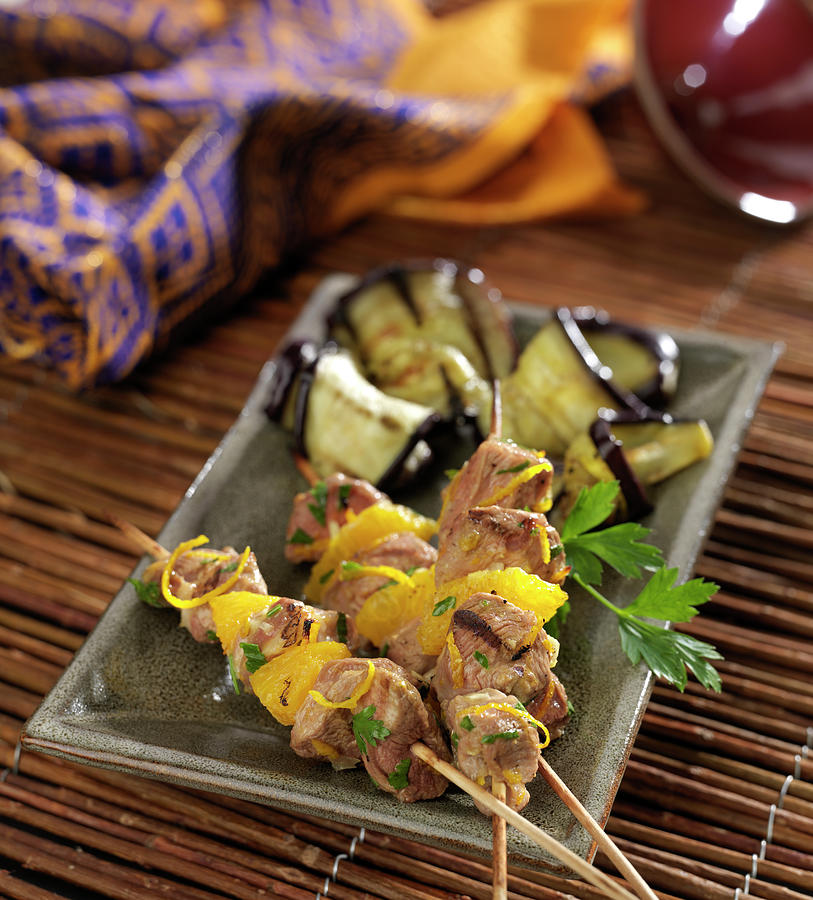 Lamb And Orange Brochettes With Grilled Aubergines Photograph by Bertram