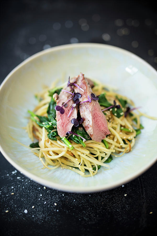 Lamb Fillet With Parsnip Noodles Photograph by Jan Wischnewski
