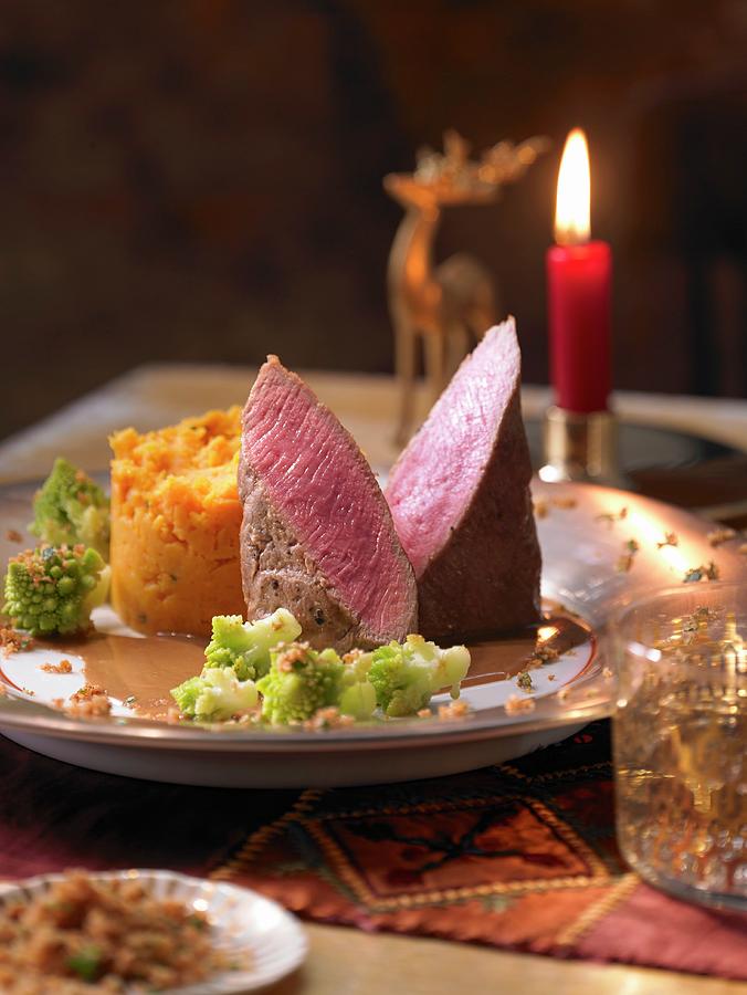 Lamb In Garlic And Cinnamon Sauce With Sweet Potato Puree And Romanesco Broccoli christmas Photograph by Jan-peter Westermann