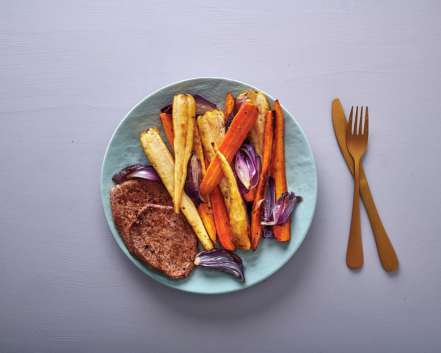Lamb Steaks With Roasted Carrots, Parsnips & Red Onion Photograph by Great Stock!