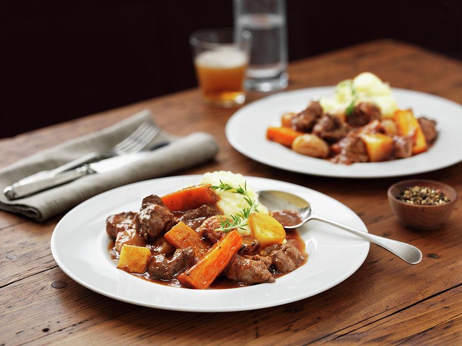 Lamb Stew With Mashed Potatoes, Carrots And Beer Photograph by Frank Adam