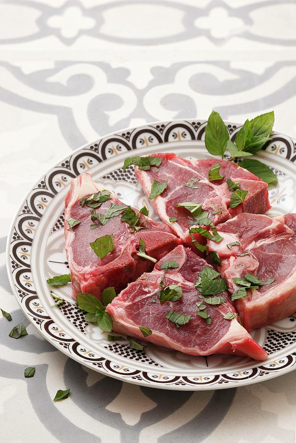 Lamb T-bone Steaks With Peppermint Photograph by Petr Gross
