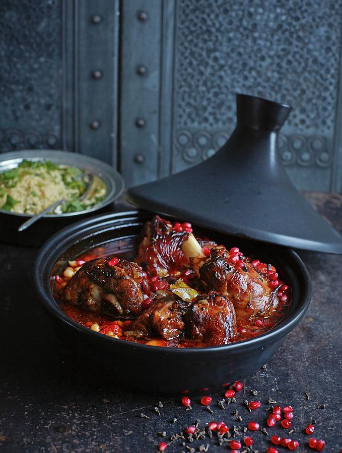 Lamb Tagine With Pomegranate, Cinnamon Flowers And Orange Couscous north Africa Photograph by Jalag / Julia Hoersch