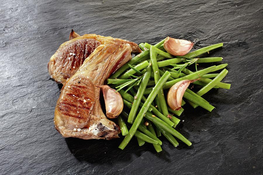 Lamb With Green Beans And Garlic Photograph by Alessandra Pizzi