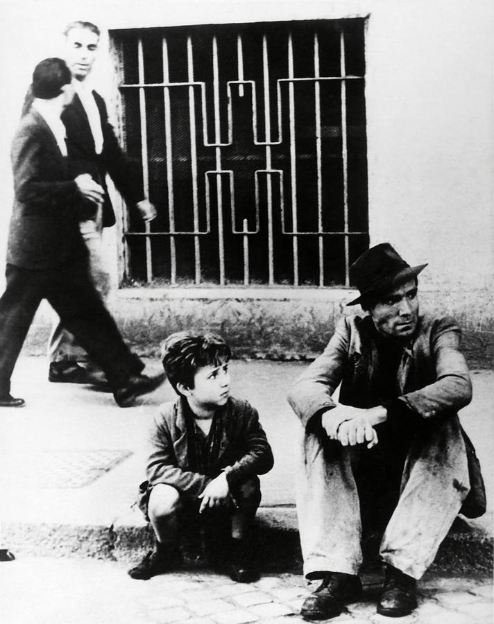 LAMBERTO MAGIORANI and ENZO STAIOLA in BICYCLE THIEF -1948- -Original title LADRI DI BICICLETTE-. Photograph by Album