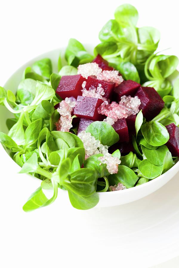 Lambs Lettuce With Diced Beetroot And Lime Caviar Photograph by Hilde Mche
