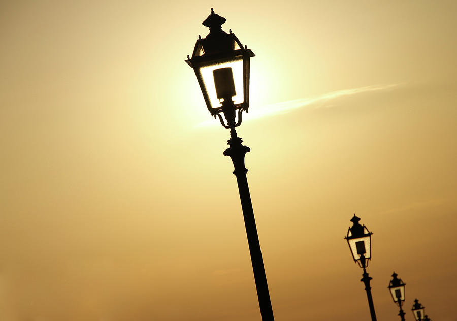 Lamps At Sunset Photograph by Sabrina Romiti