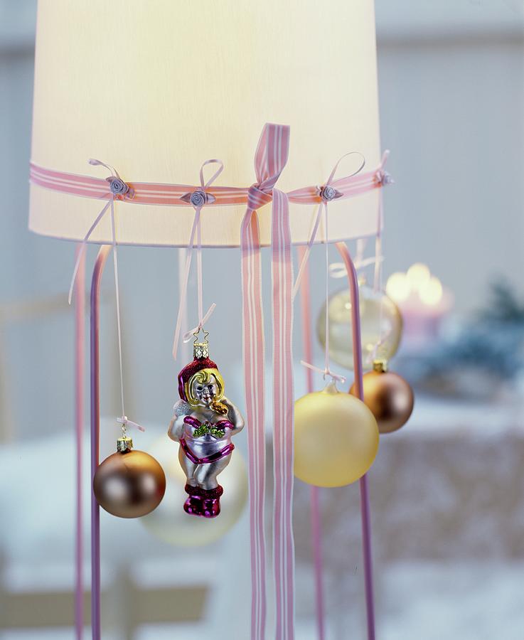 Lampshade Festively Decorated With Ribbons And Christmas Tree Baubles Photograph by Matteo Manduzio