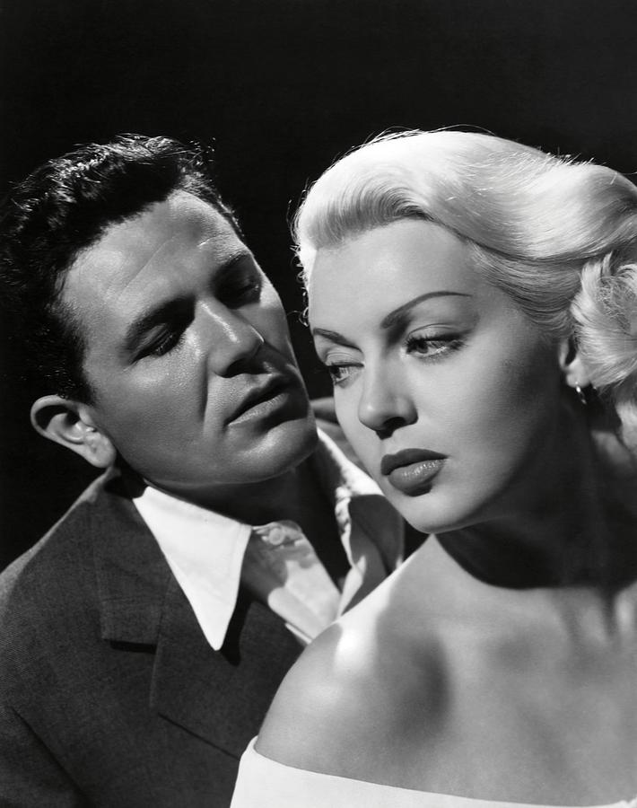 LANA TURNER and JOHN GARFIELD in THE POSTMAN ALWAYS RINGS TWICE -1946-. Photograph by Album