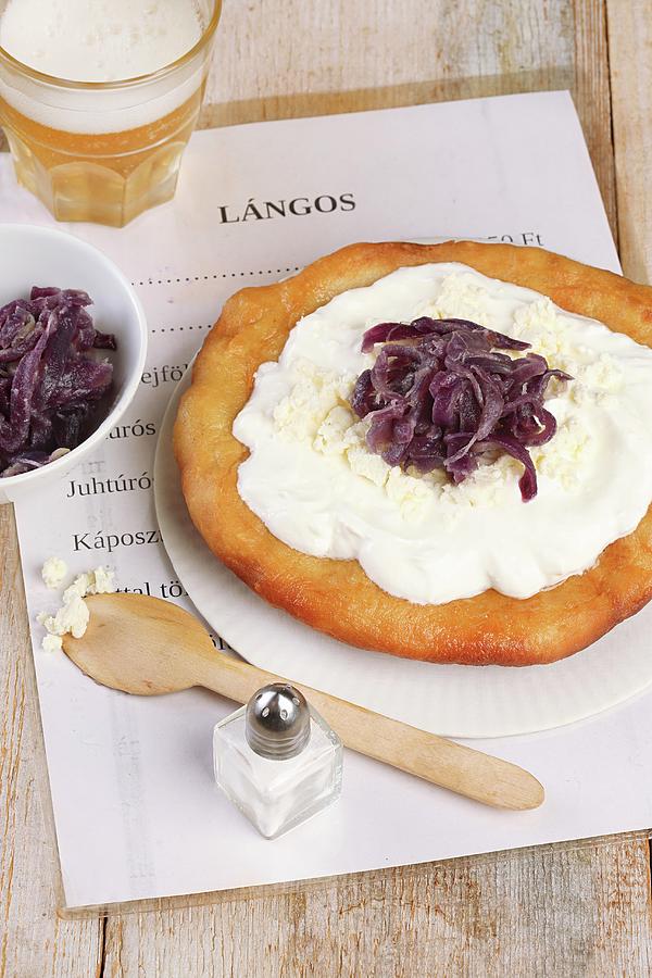 Langos yeast Flat Bread, Hungary With Sour Cream, Feta And Onion Jam Photograph by Zita Csig