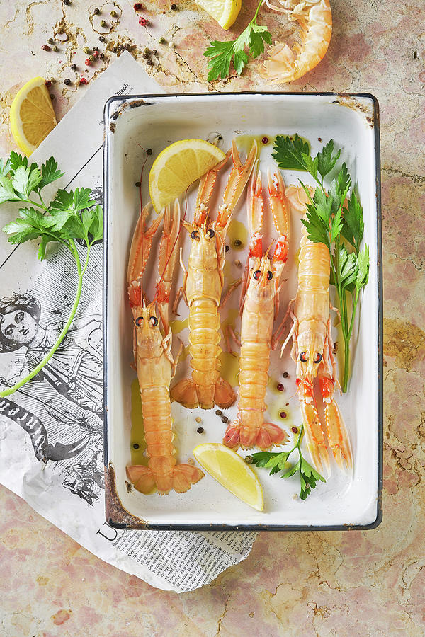Langoustines In Oventray With Lemon, Parsley And Olive Oil Photograph by Arjan Smalen Photography
