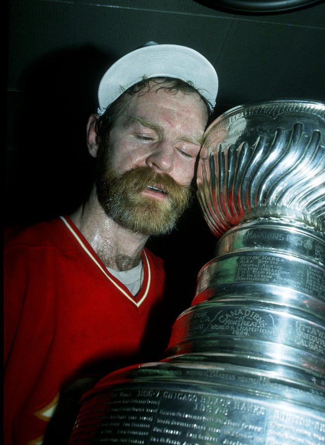 Lanny Mcdonald Hugs The Stanley Cup Photograph by B Bennett