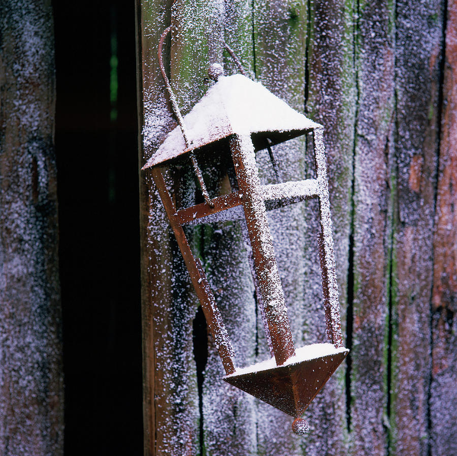 Lantern Hanging On Wooden Wall Photograph by Luc Wauman
