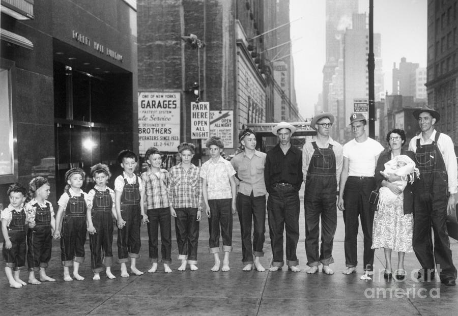 Large Family Barefoot In Manhattan Photograph by Bettmann