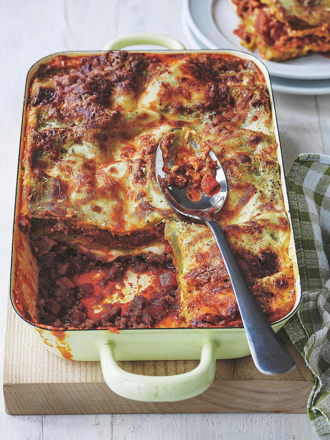 Lasagne Al Forno Made With Tomatoes, Sundried Tomato Paste Mozzarella And Parmesan Photograph by Michael Paul