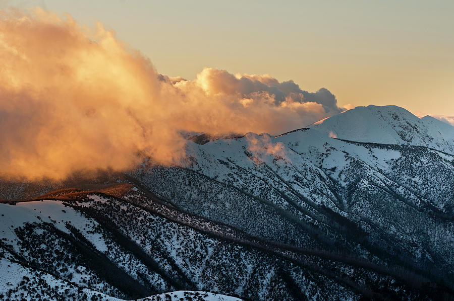 Late Light Makes The Clouds Glow On Razorback Ridge At Mt. Feathertop In The Alpine National Park, Victoria, Australia Photograph by Don Fuchs