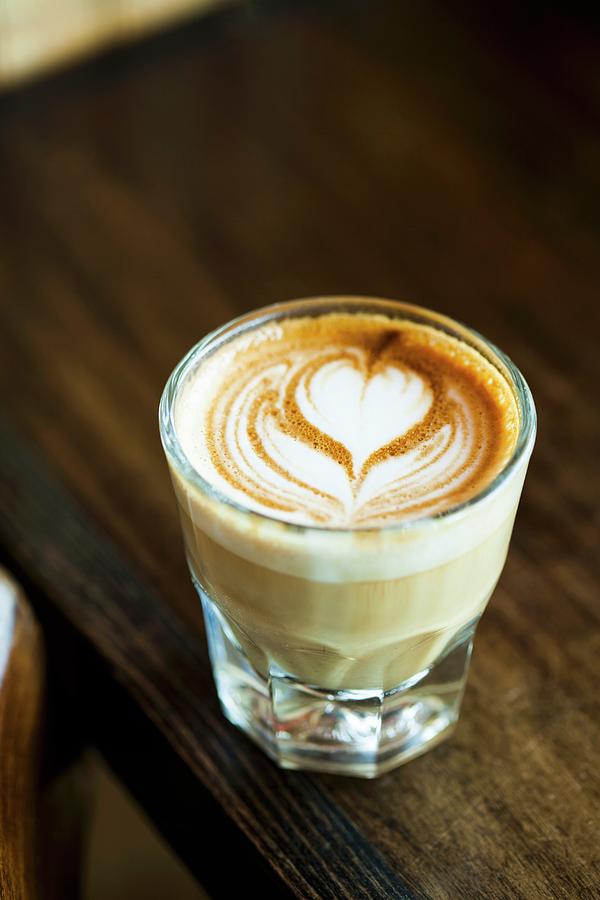 Latte With A Heart Design In A Glass Photograph by Tieuli, Anthony ...