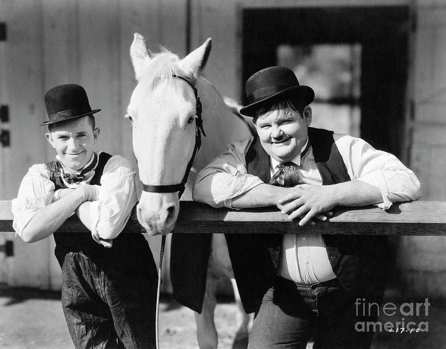 Laurel And Hardy Posing With Horse Photograph by Bettmann