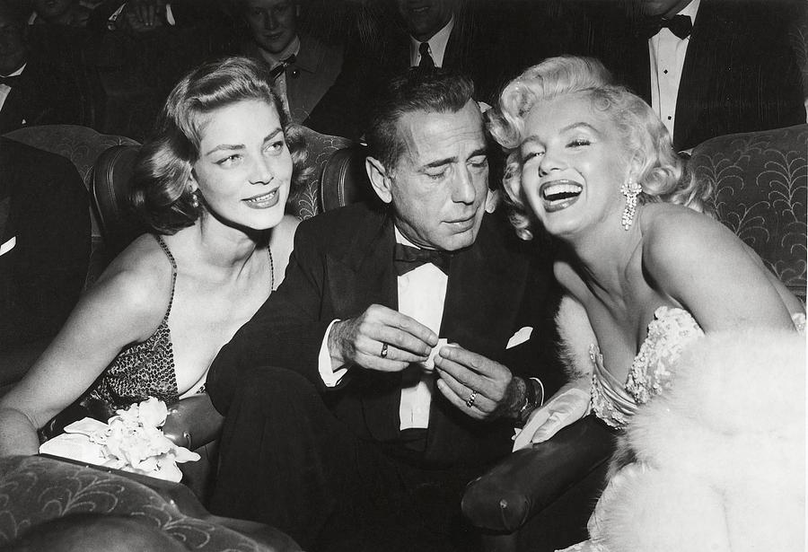 Lauren Bacall . Humphrey Bogart . Marilyn Monroe . Photograph by Album