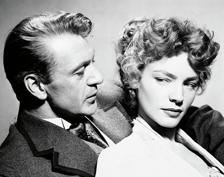 LAUREN BACALL and GARY COOPER in BRIGHT LEAF -1950-. Photograph by Album