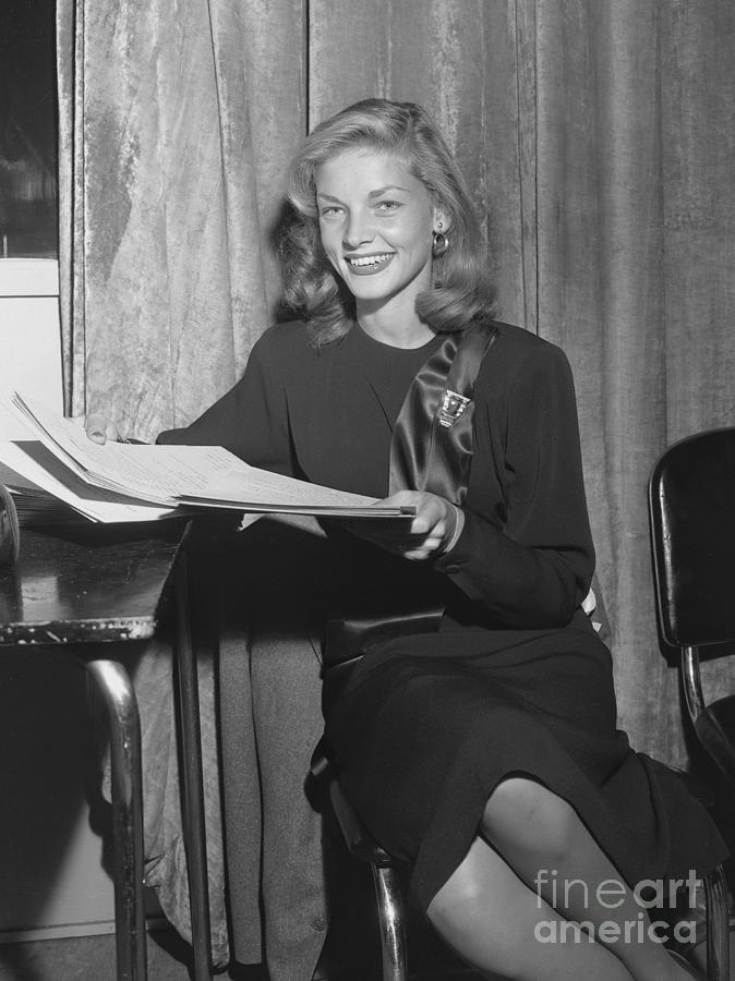 Lauren Bacall Photograph - Lauren Bacall Studies Script by Cbs Photo Archive
