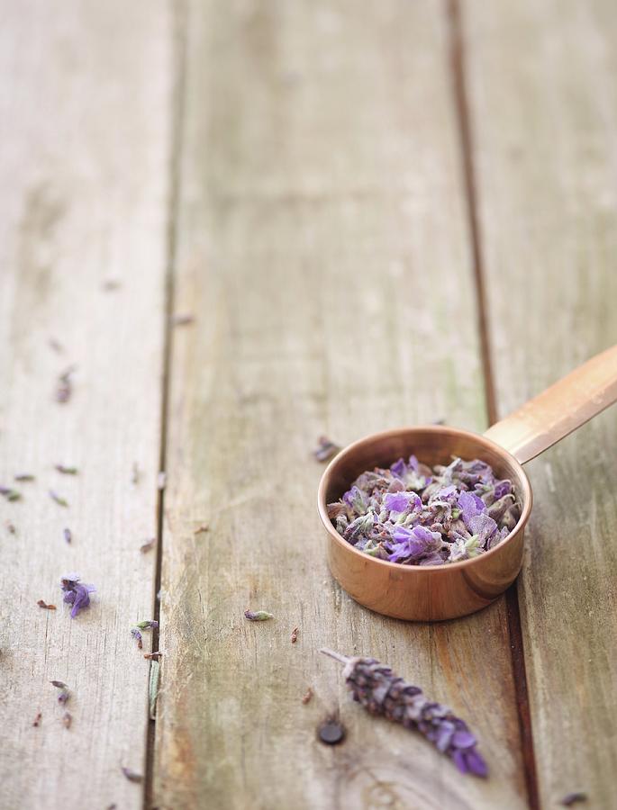 Lavender Petals In A Measuring Cup Photograph by Great Stock!