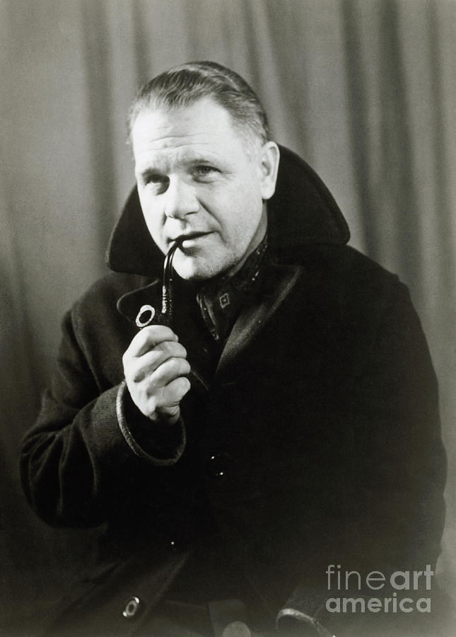 Lawrence Durrell Smoking A Pipe Photograph by Bettmann