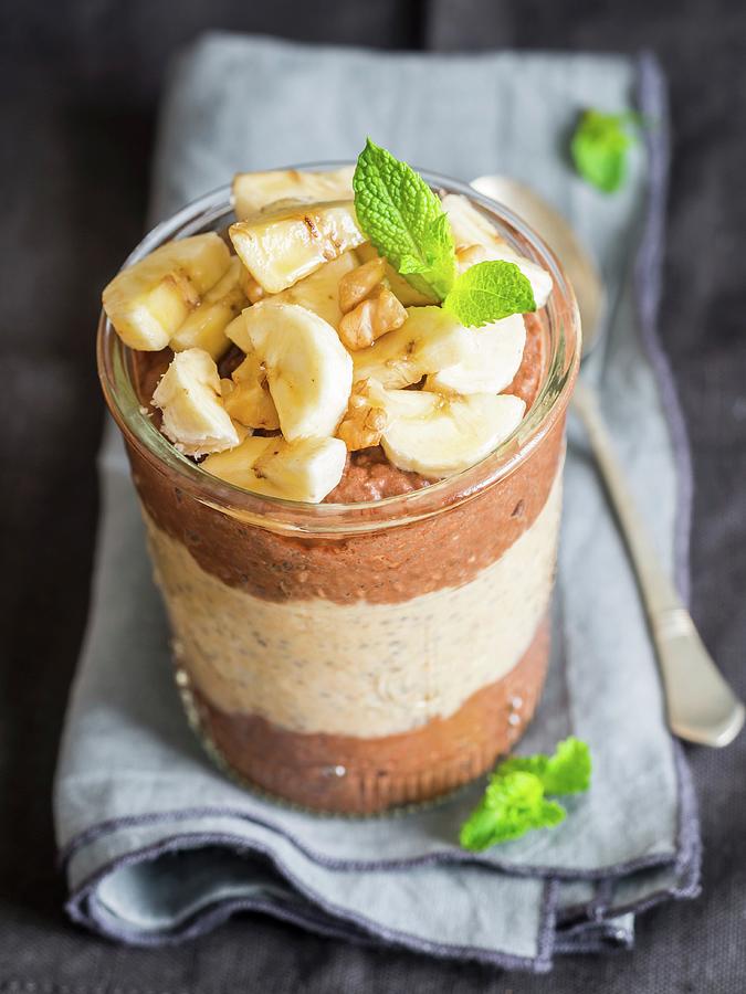 Layered Chocolate Peanut Butter Wiht Chia Pudding And Banana Photograph by Magdalena Paluchowska