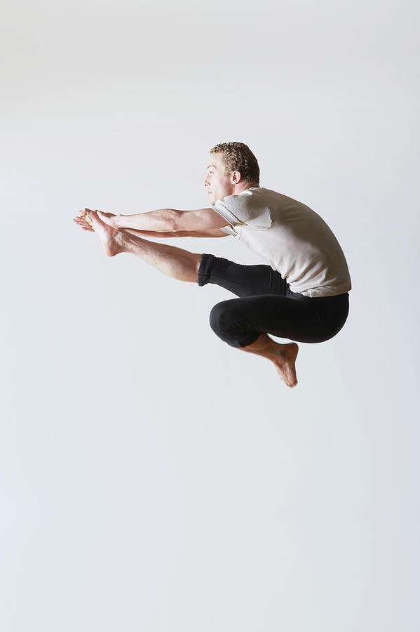 Leaping Ballet Dancer In Mid-air Photograph by Moodboard - Mike Watson