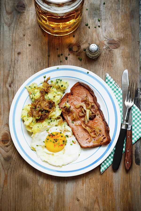 Leberkse beef And Pork Meatloaf With Potatoe Salad And A Fried Egg Photograph by Sporrer/skowronek