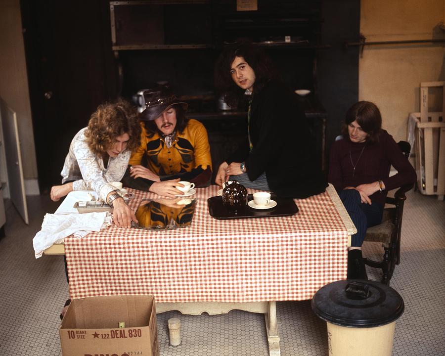 Robert Plant Photograph - Led Zeppelin Band Members Sitting In Kitchen At Chateau Marmont by Globe Photos