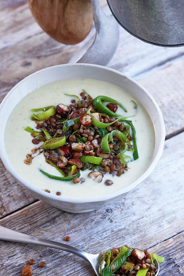 Leek And Cheese Soup With Lentils And Nuts Photograph by Misha Vetter