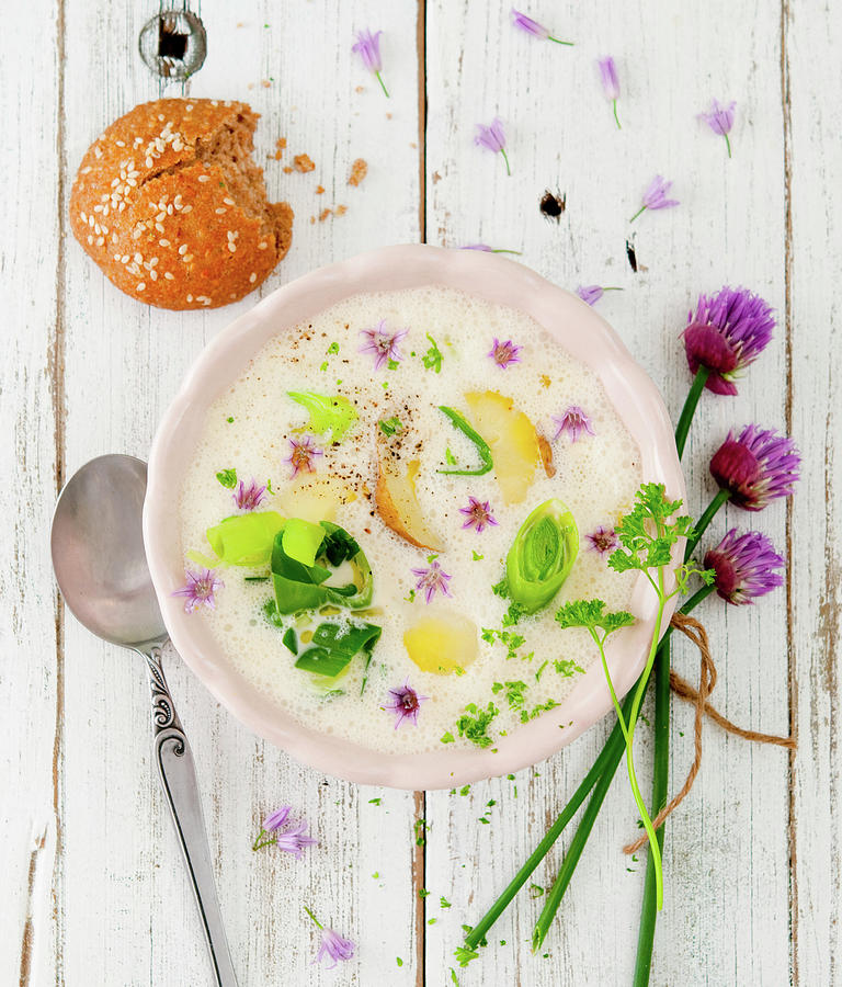 Leek And Potato Soup With Chive Blossoms Photograph by Udo Einenkel