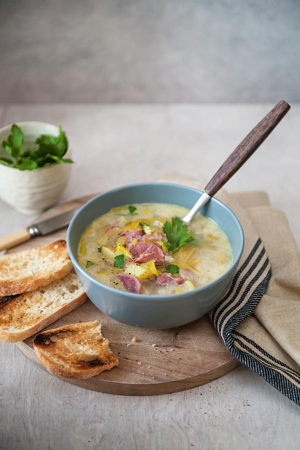 Leek And Potato Soup With Ham And Toast Photograph by Magdalena Hendey