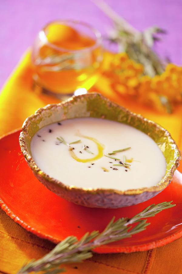 Leek Cream Soup With Olive Oil And Rosemary Photograph by Studio Lipov