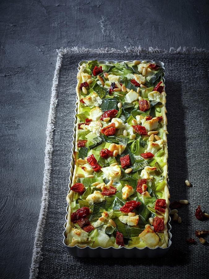 Leek Quiche With Feta, Sun-dried Tomatoes And Pine Nuts Photograph by Maximilian Carlo Schmidt