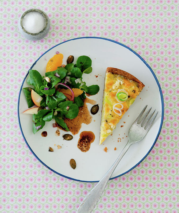 Leek Quiche With Lambs Lettuce And A Pumpkin Seed Oil Vinaigrette Photograph by Udo Einenkel